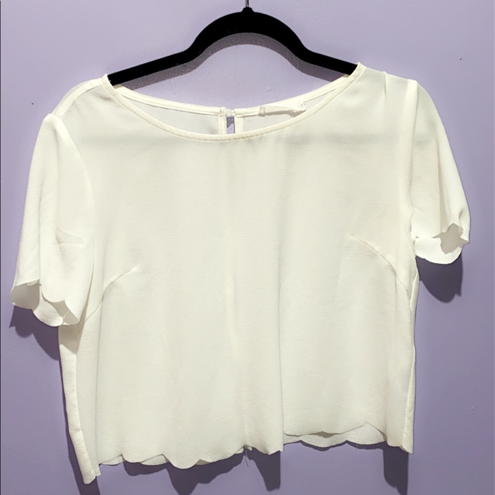 White women’s crop top with scalloped detail